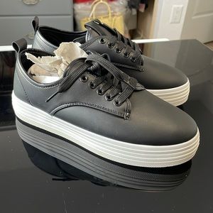 Platform Shoes. Black on white soles. New without tags. Size 8 1/2